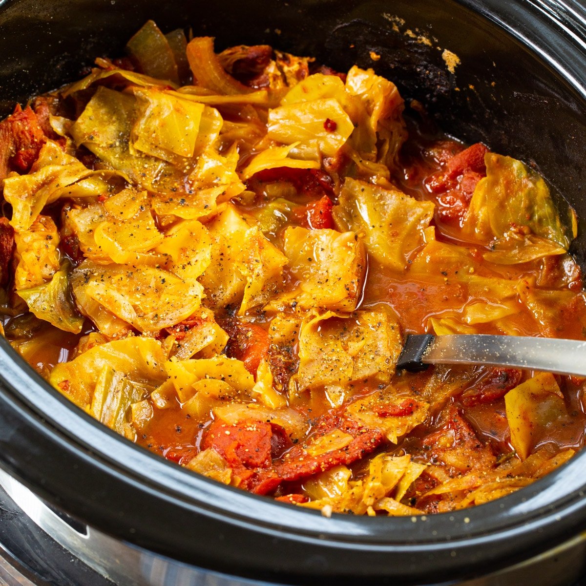 Cabbage and Stewed Tomatoes in a slow cooker.