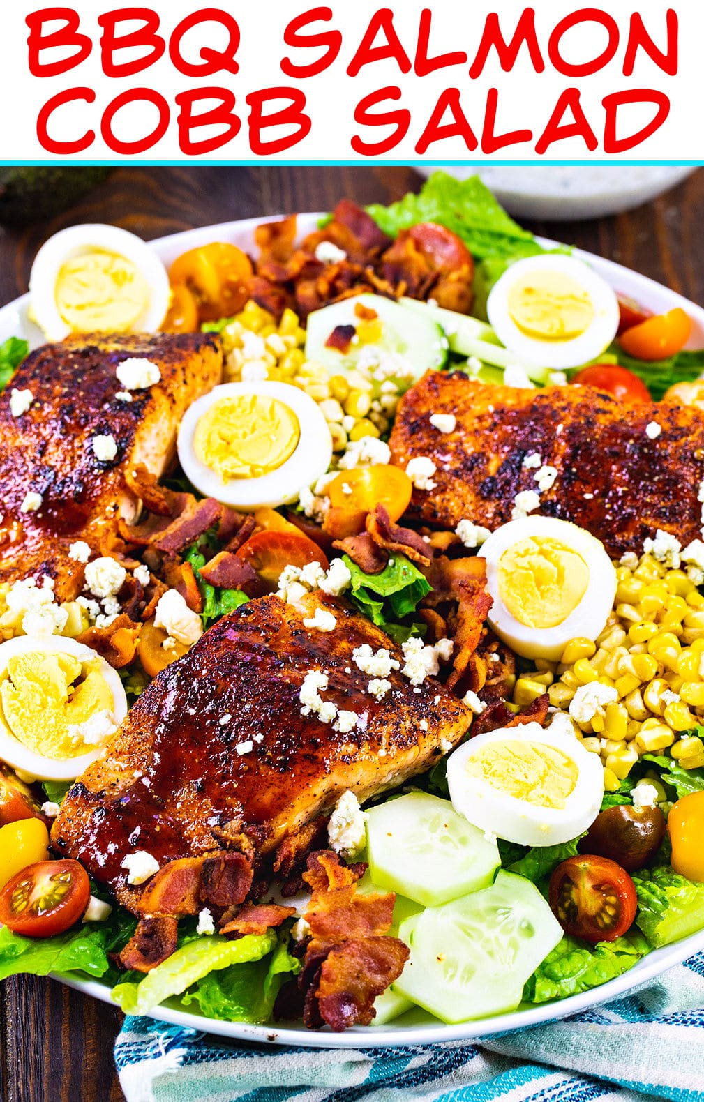 BBQ Salmon Cobb Salad on a large plate.