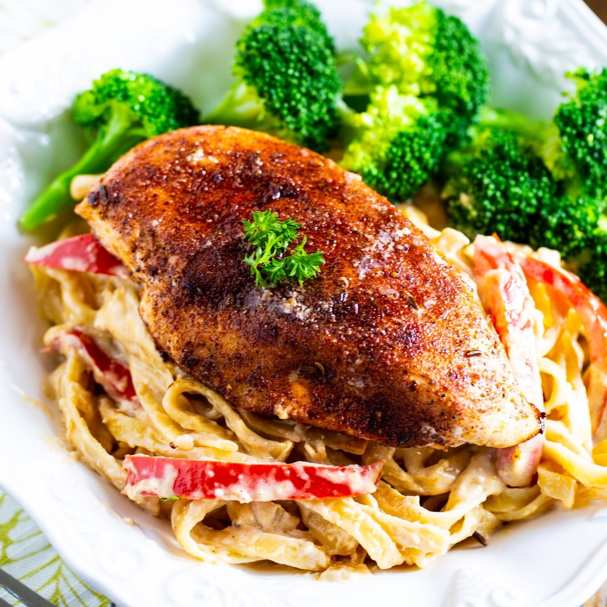 Blackened Chicken Fettuccine in a pasta bowl.