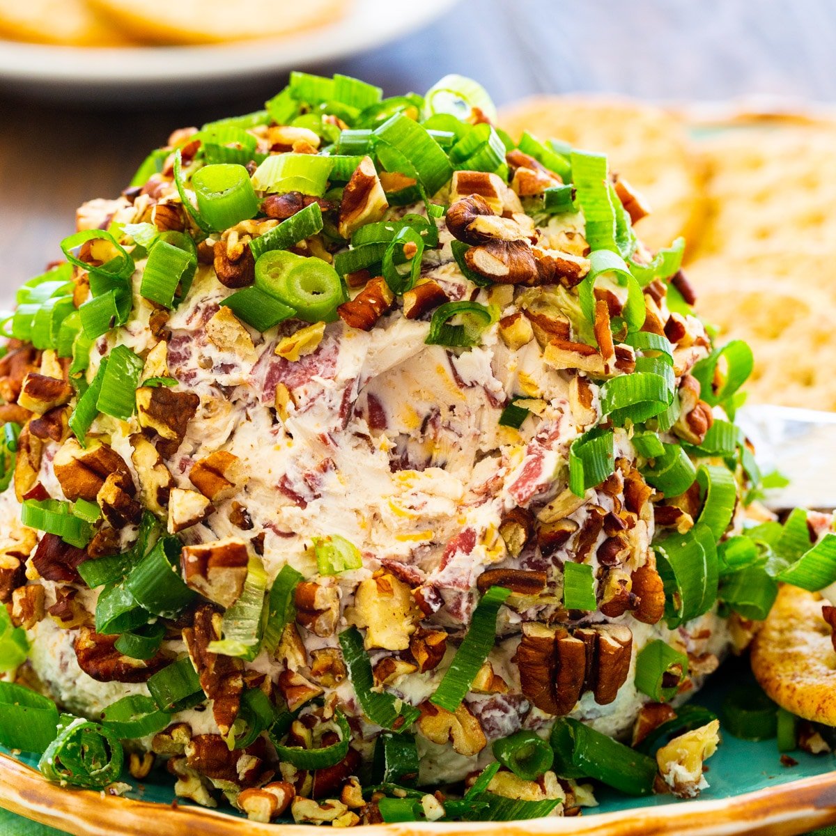Chipped Beef Cheese Ball covered with green onions and chopped pecans.