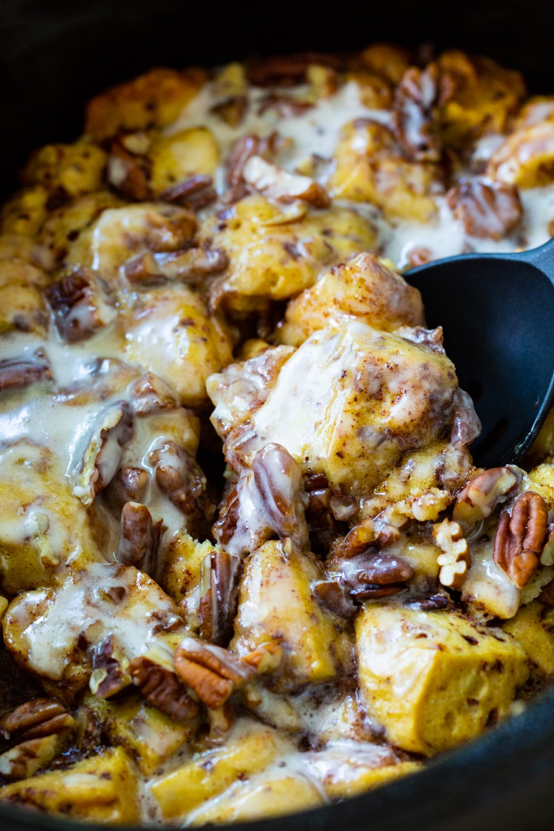 Crock Pot Cinnamon Roll Casserole in slow cooker.