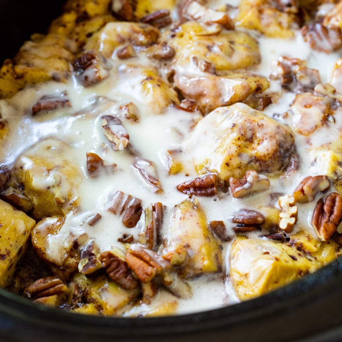 Crock Pot Cinnamon Roll Casserole in slow cooker.