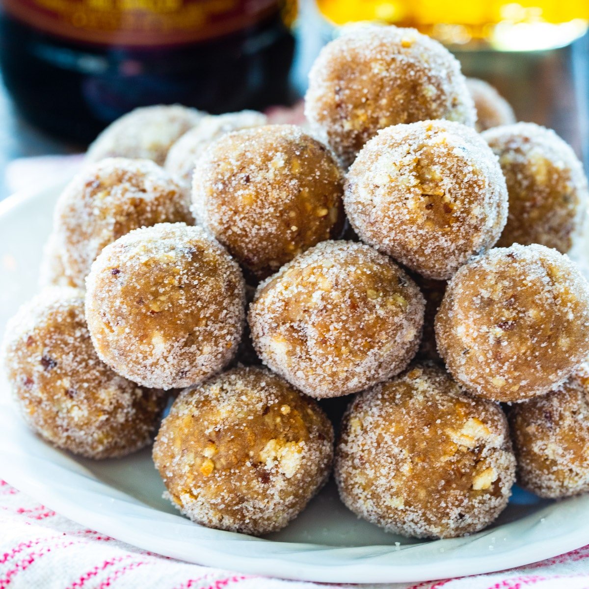 Classic Rum Balls piled up on a plate.