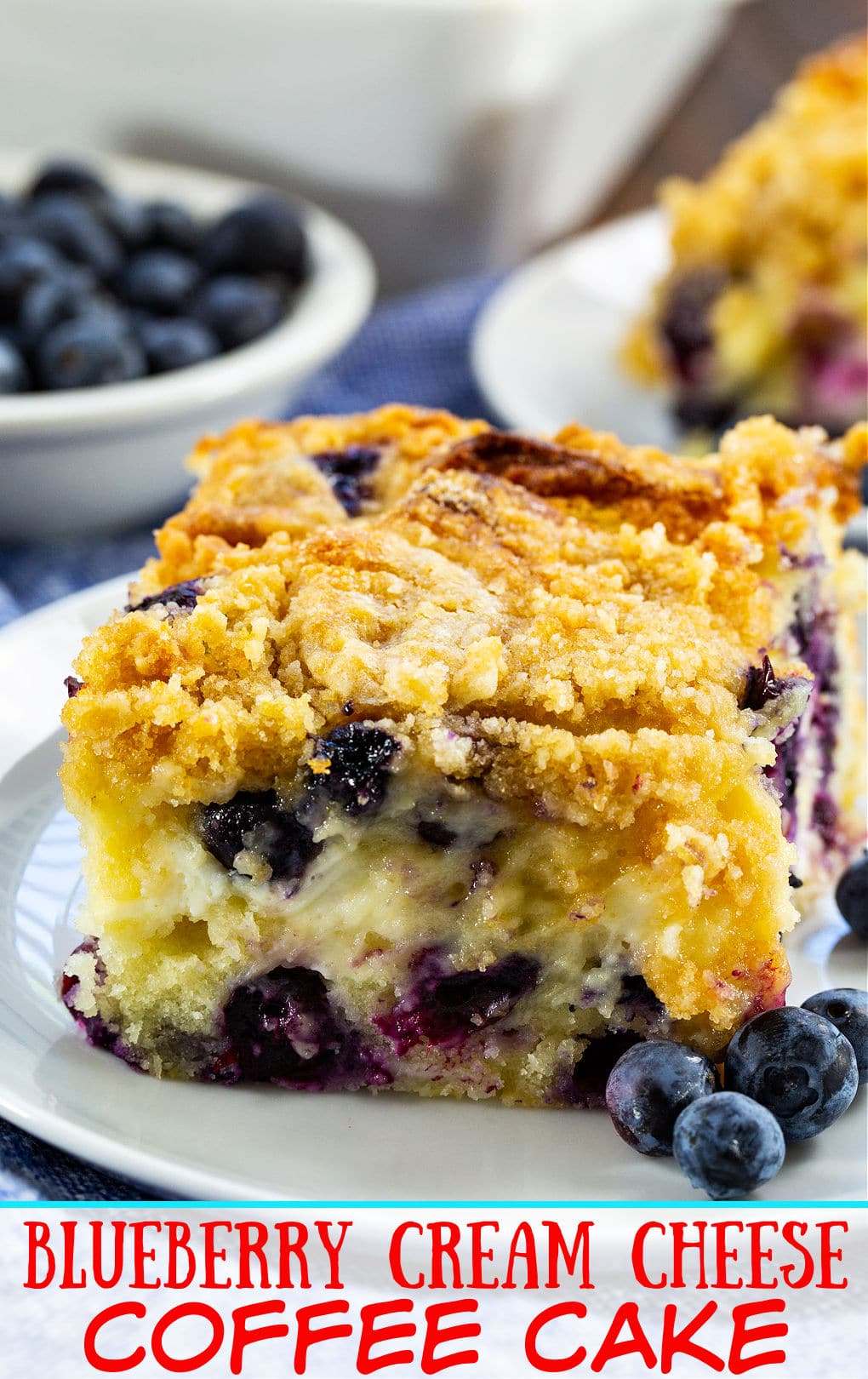 Slice of Blueberry Cream Cheese Coffee Cake on a small plate.