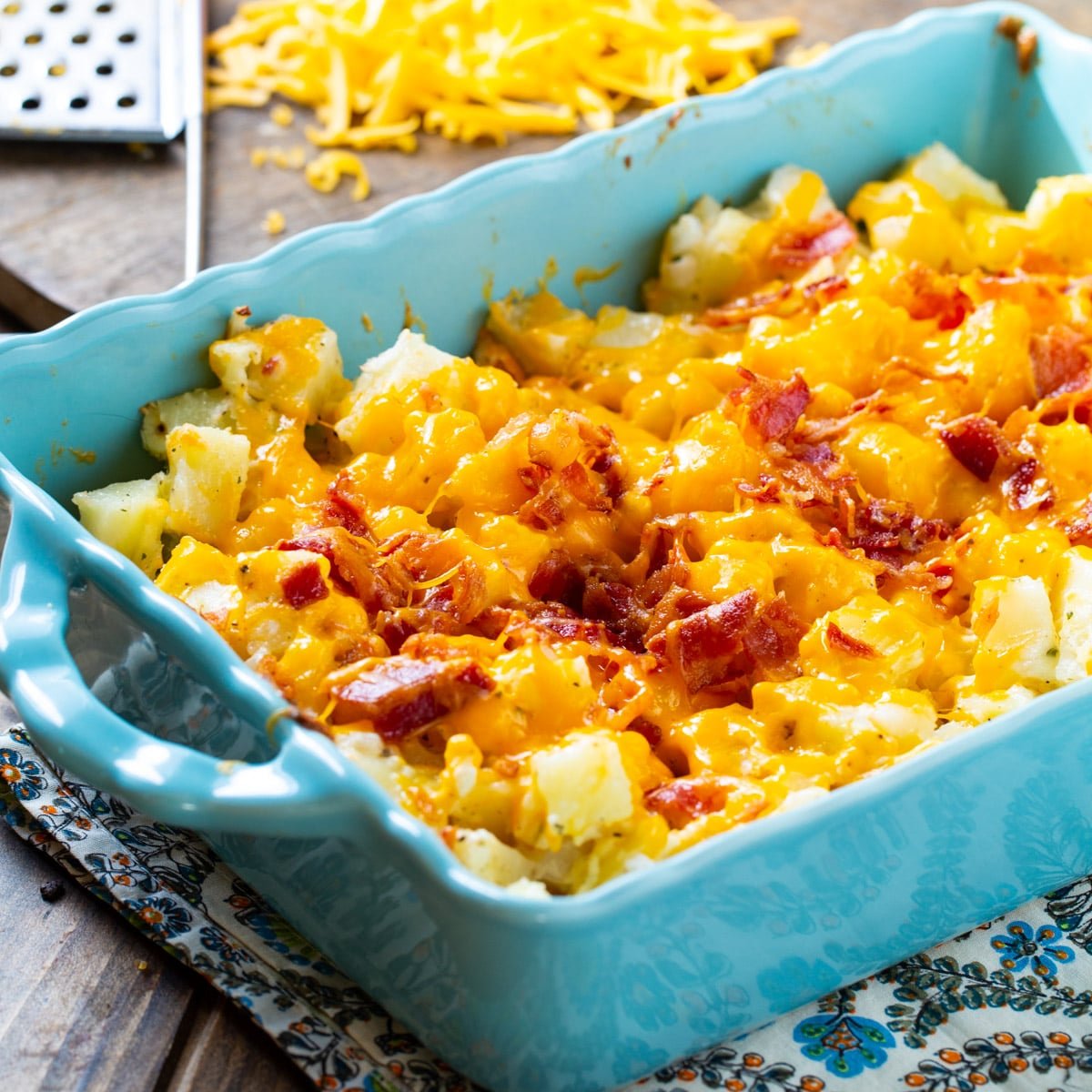 Cheesy Bacon Ranch Potatoes in a blue baking dish.