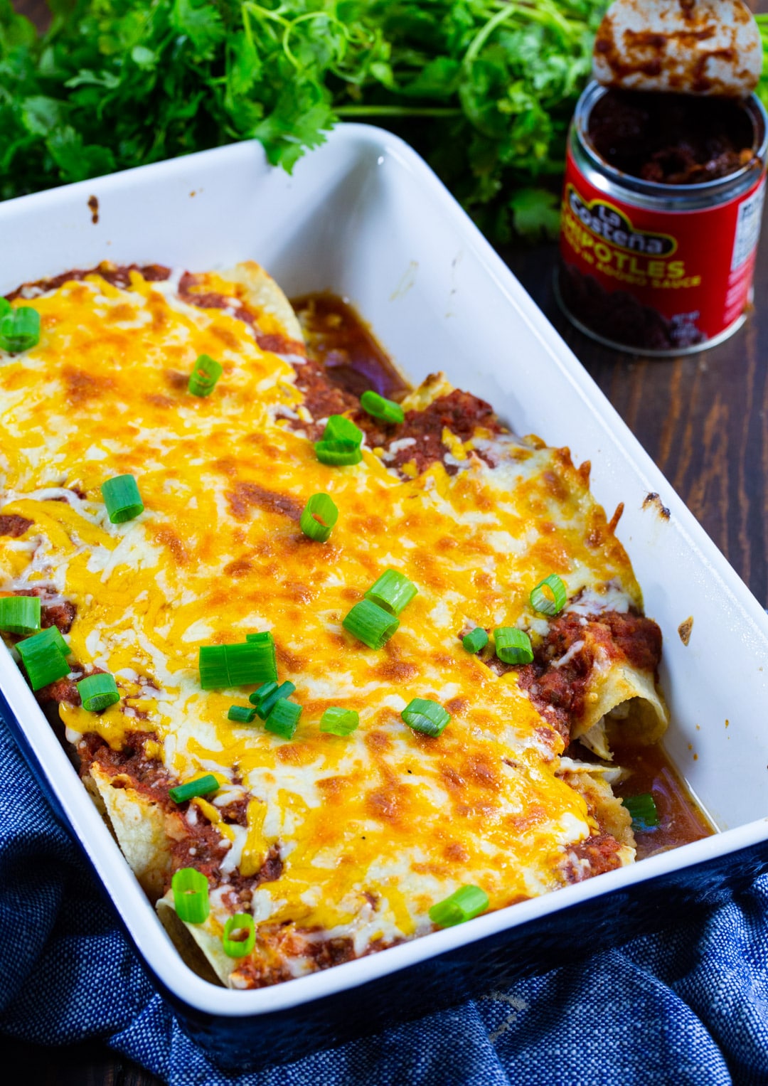 Enchiladas in a baking dish.