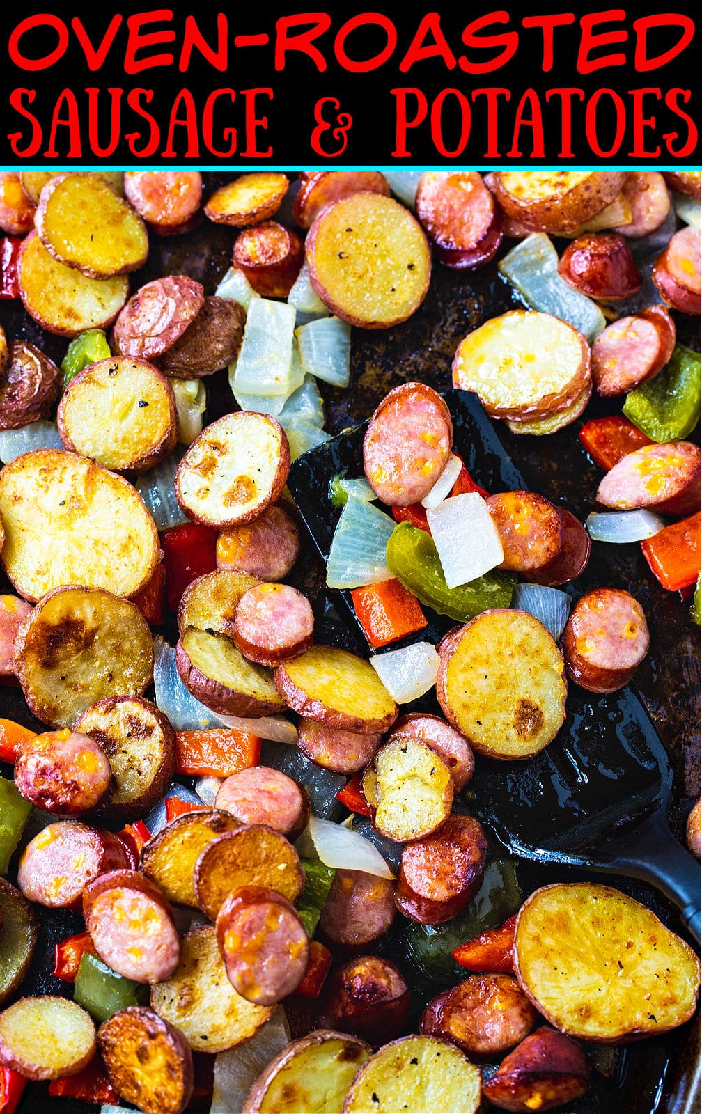 Sausage and Potatoes on baking sheet.