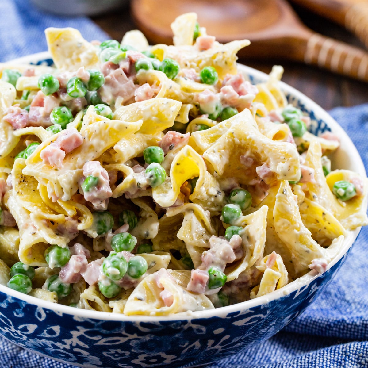 Ranch Noodles with Ham and Peas in a serving bowl.