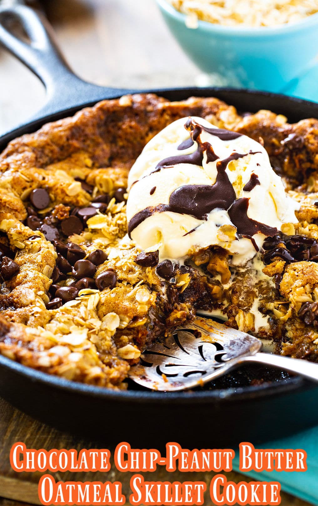 Chocolate Chip-Peanut Butter Oatmeal Skillet Cookie with a slice removed.