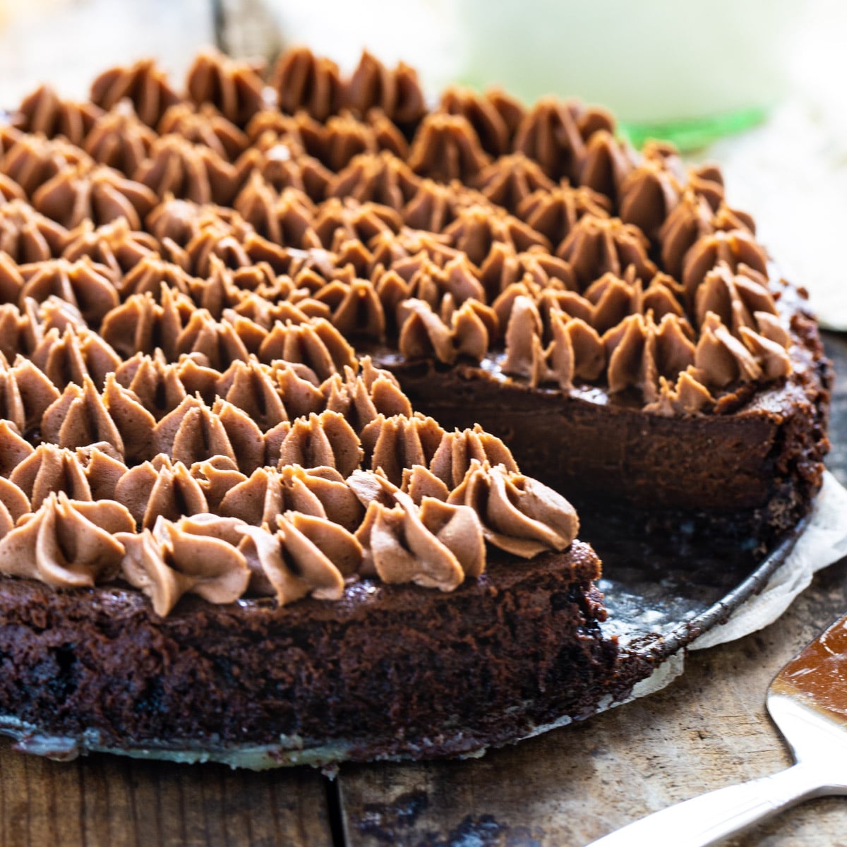 Chocolate Velvet Dessert- with a slice cut out.