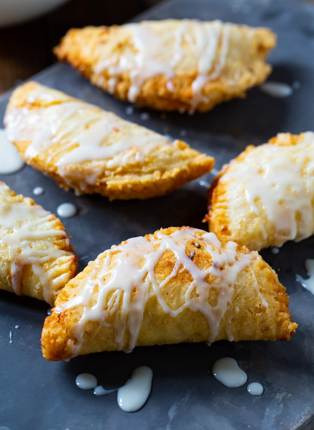 Peach Pies on a baking sheet.