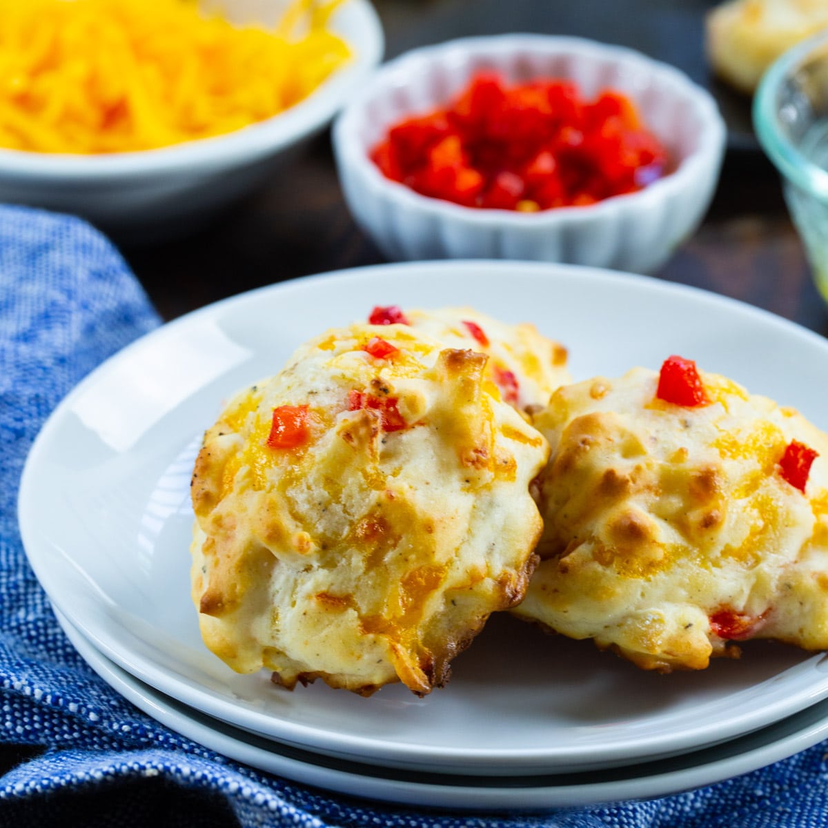 Three Pimento Cheese Drop Biscuits on a small plate.