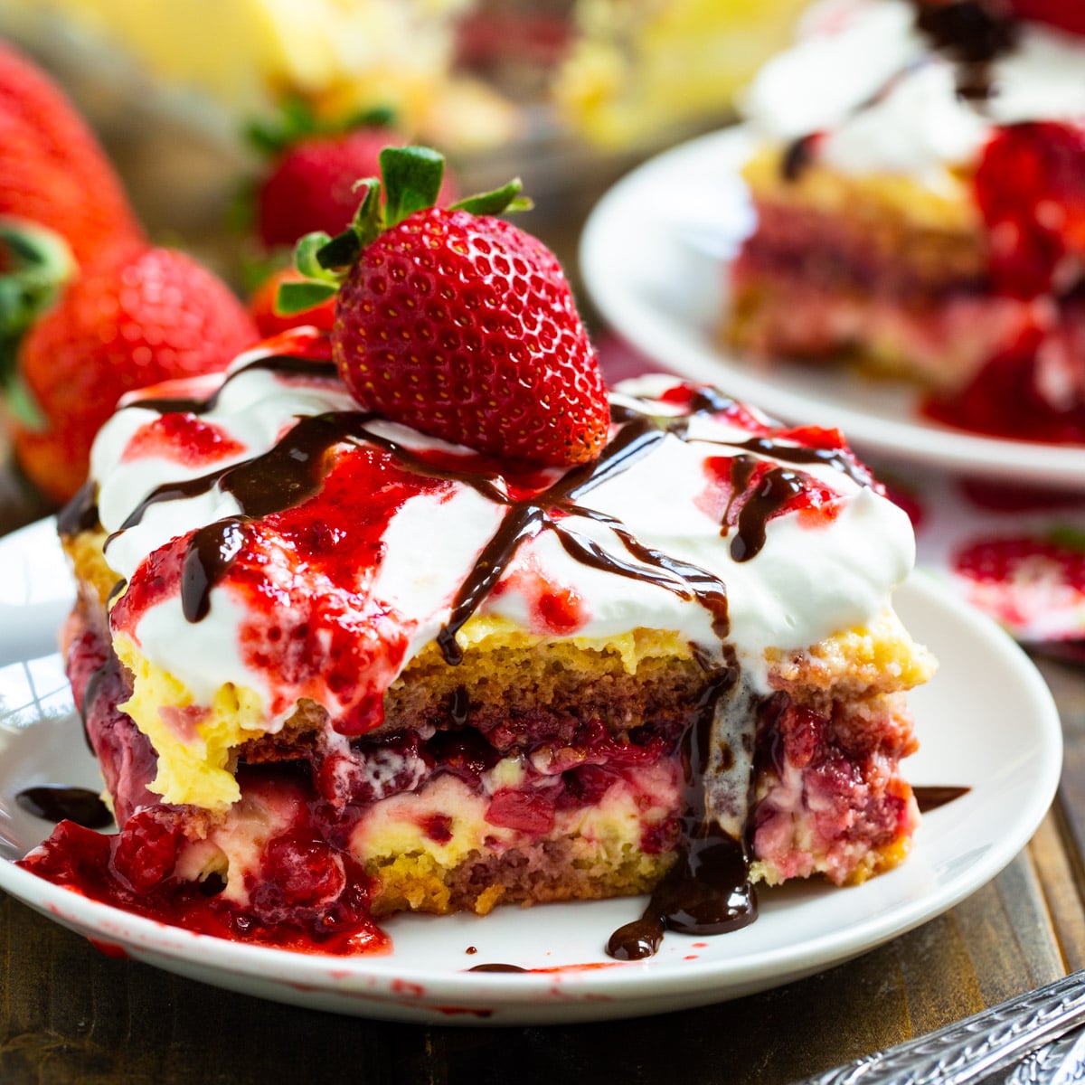 Slice of No-Bake Strawberry Lasagna on a plate.