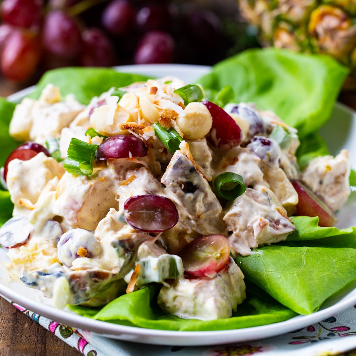 Tropical Chicken Salad on a bed of lettuce.