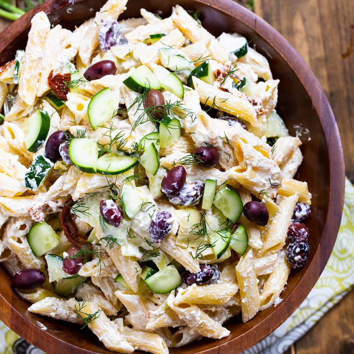 Tzatziki Pasta Salad in a large wooden bowl.