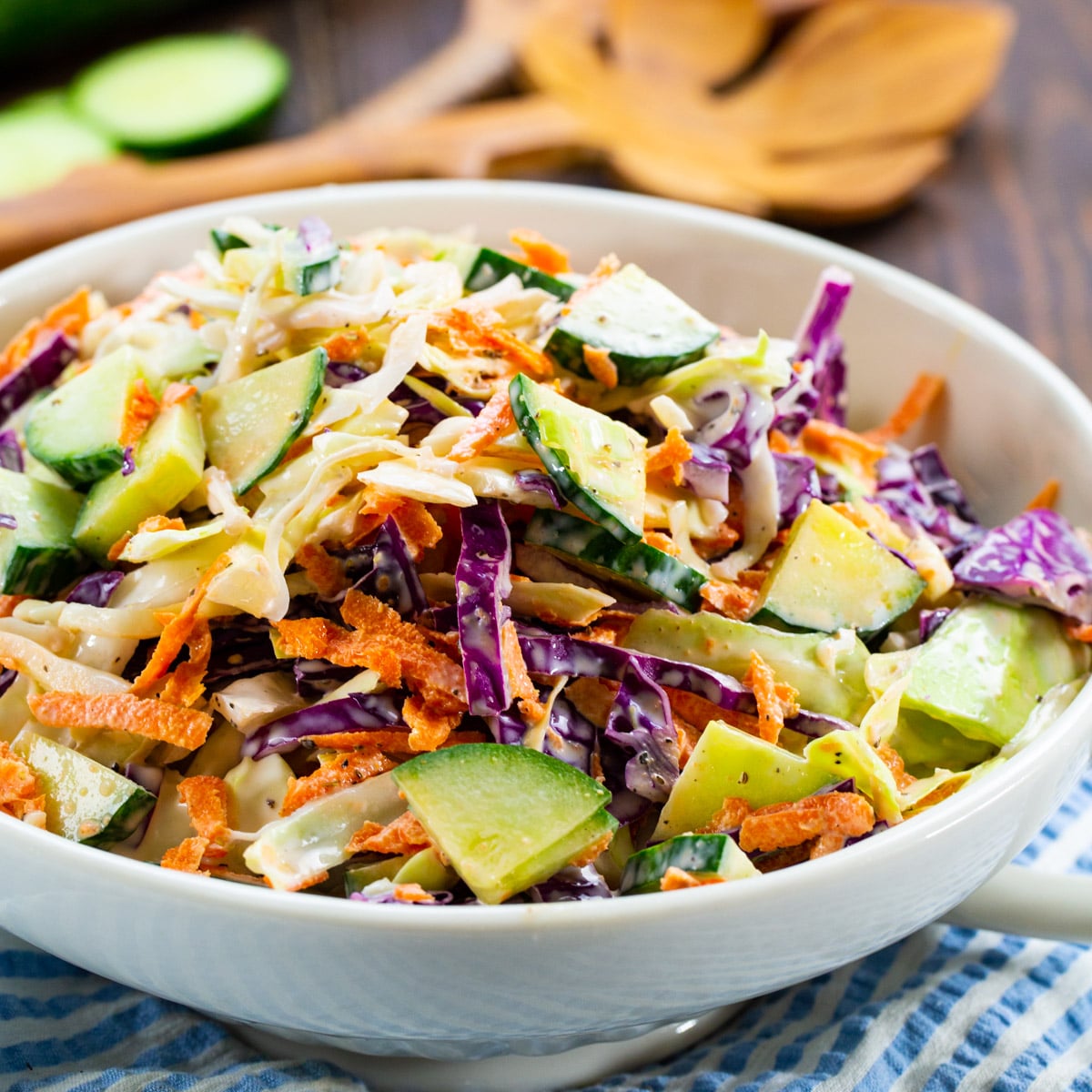 Cucumber Coleslaw in a white bowl.