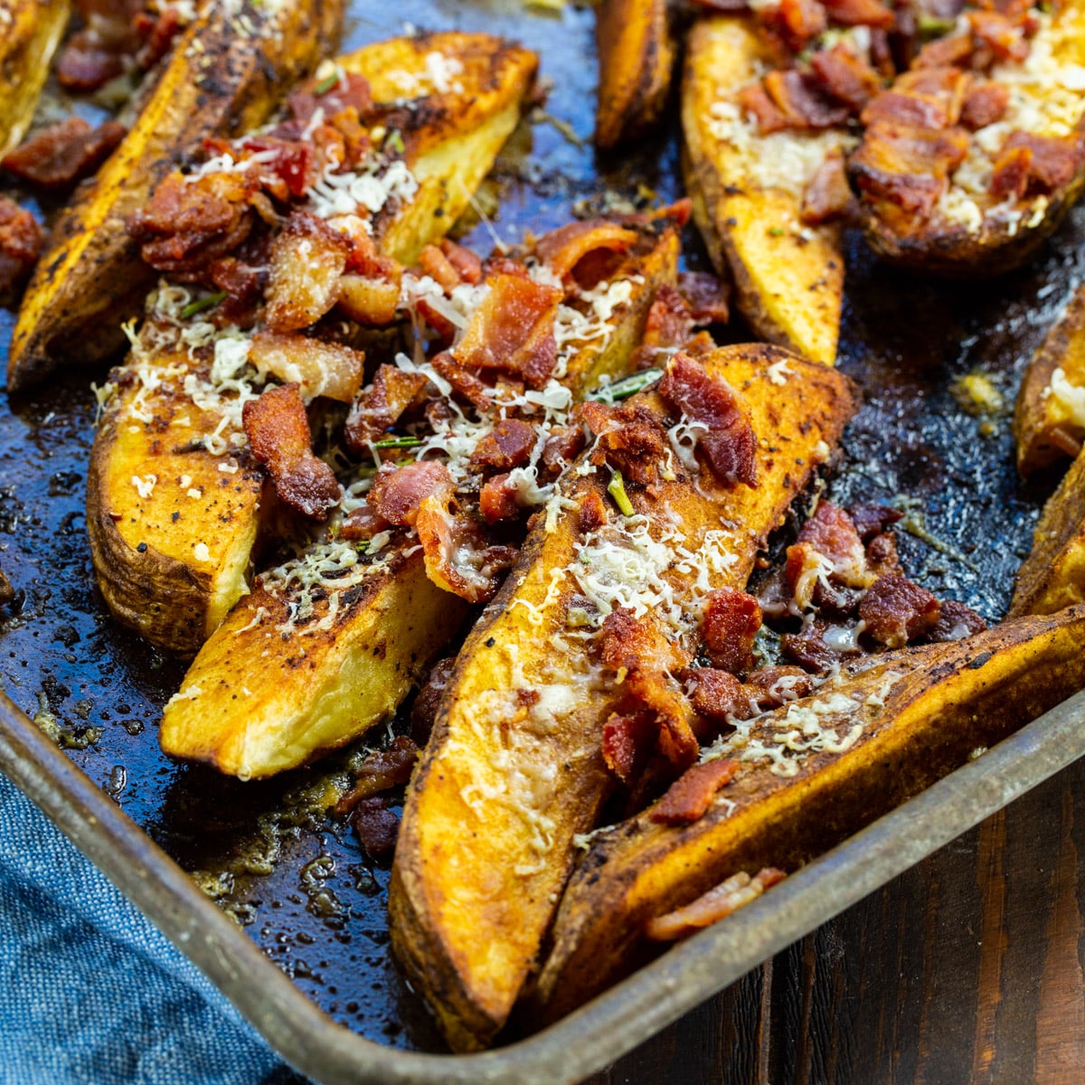 Bacon Parmesan Steak Fries on baking sheet.