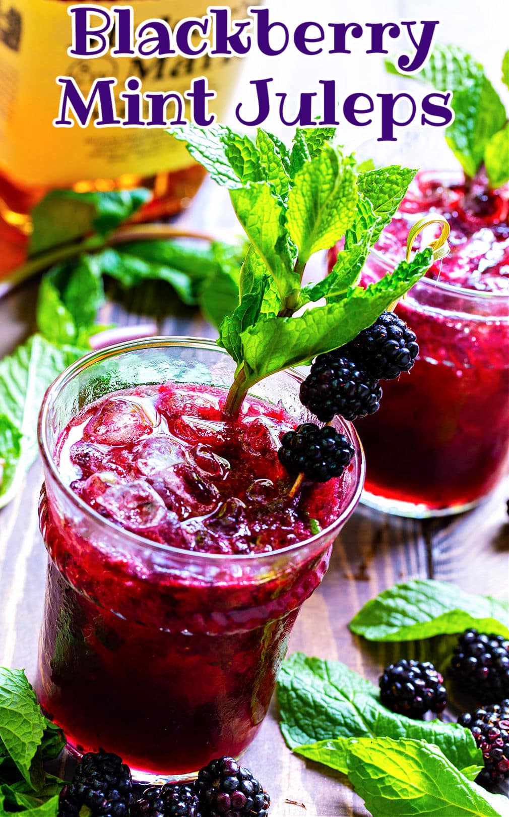 Blackberry Mint Juleps in two glasses.