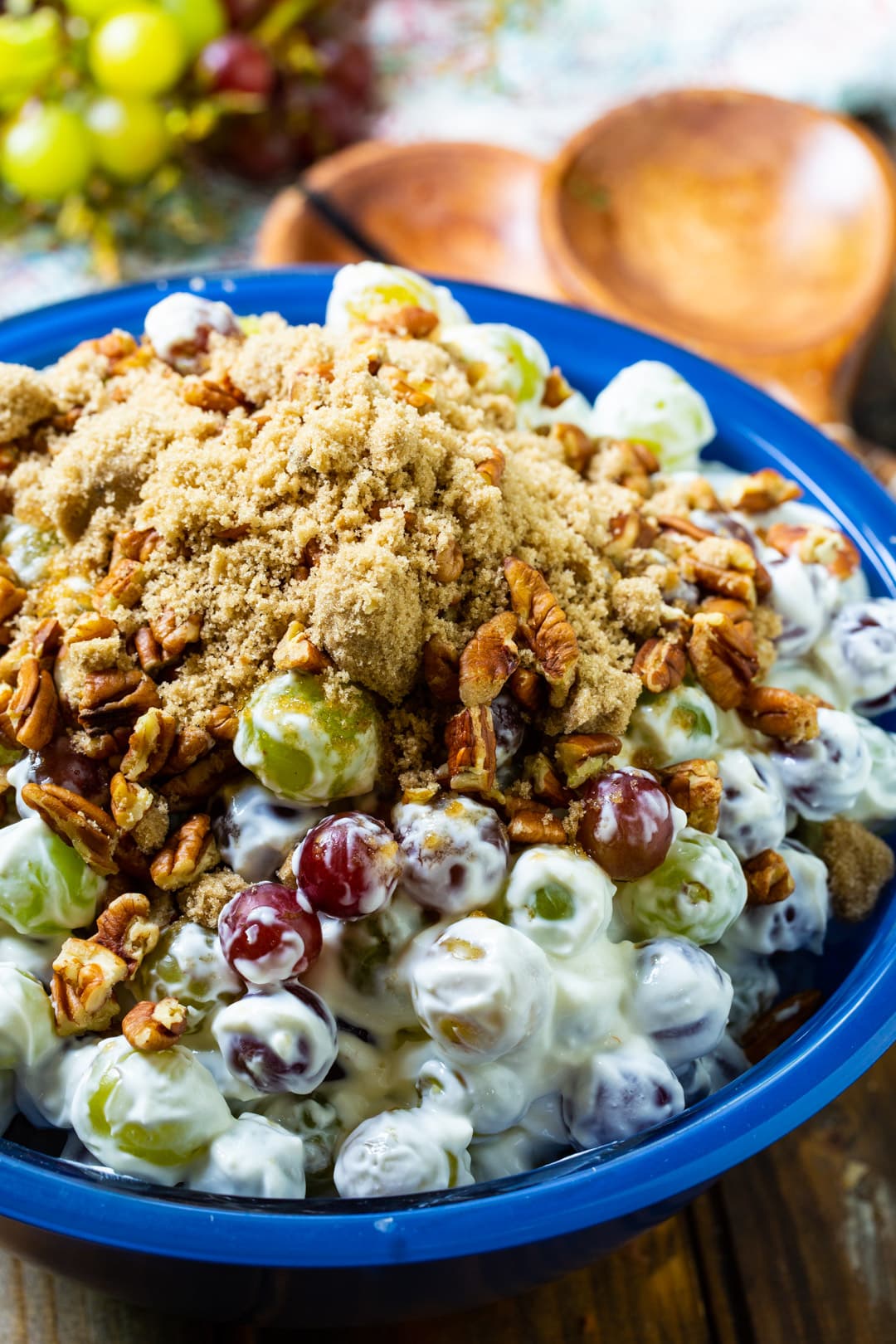 Creamy Grape Salad in large blue bowl.