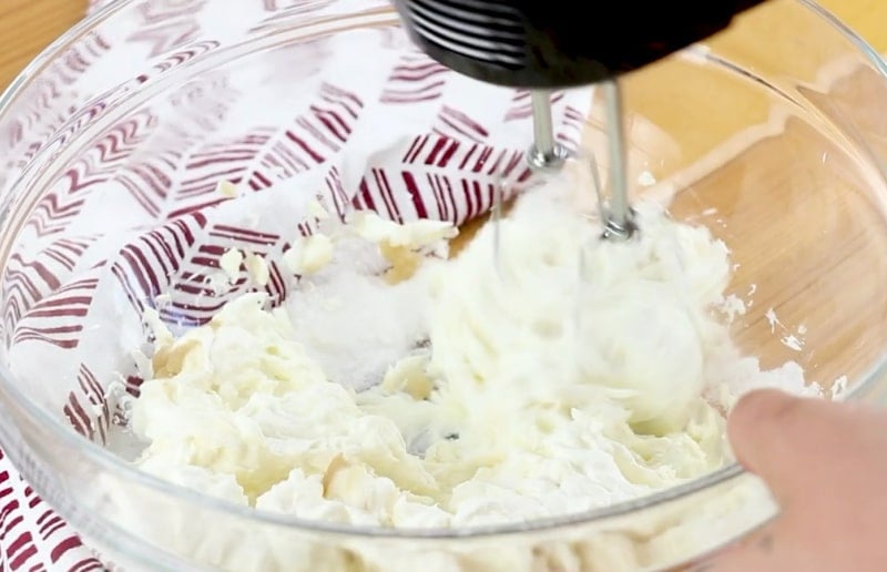 Cream cheese mixture being mixed.