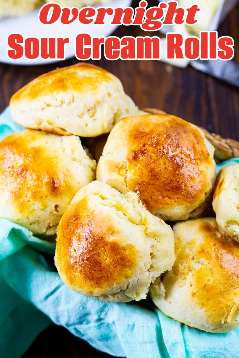 Overnight Sour Cream Rolls in a bread basket.