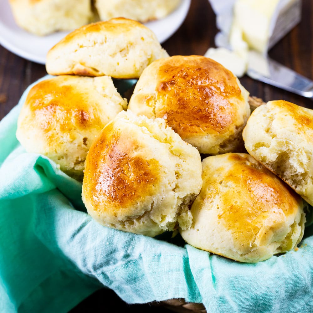 Overnight Sour Cream Rolls in a bread basket.