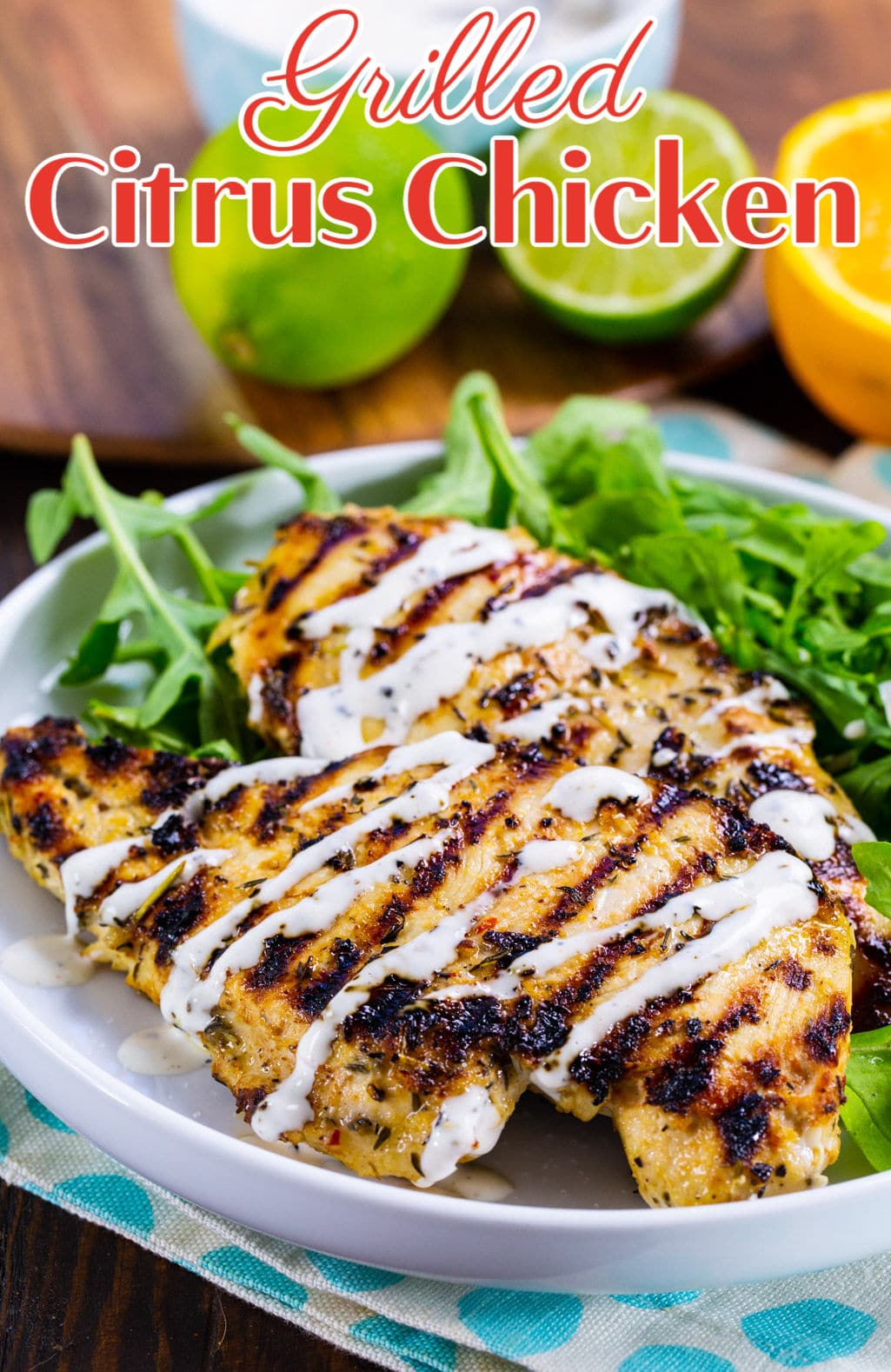 Grilled Citrus Chicken drizzled with white sauce.