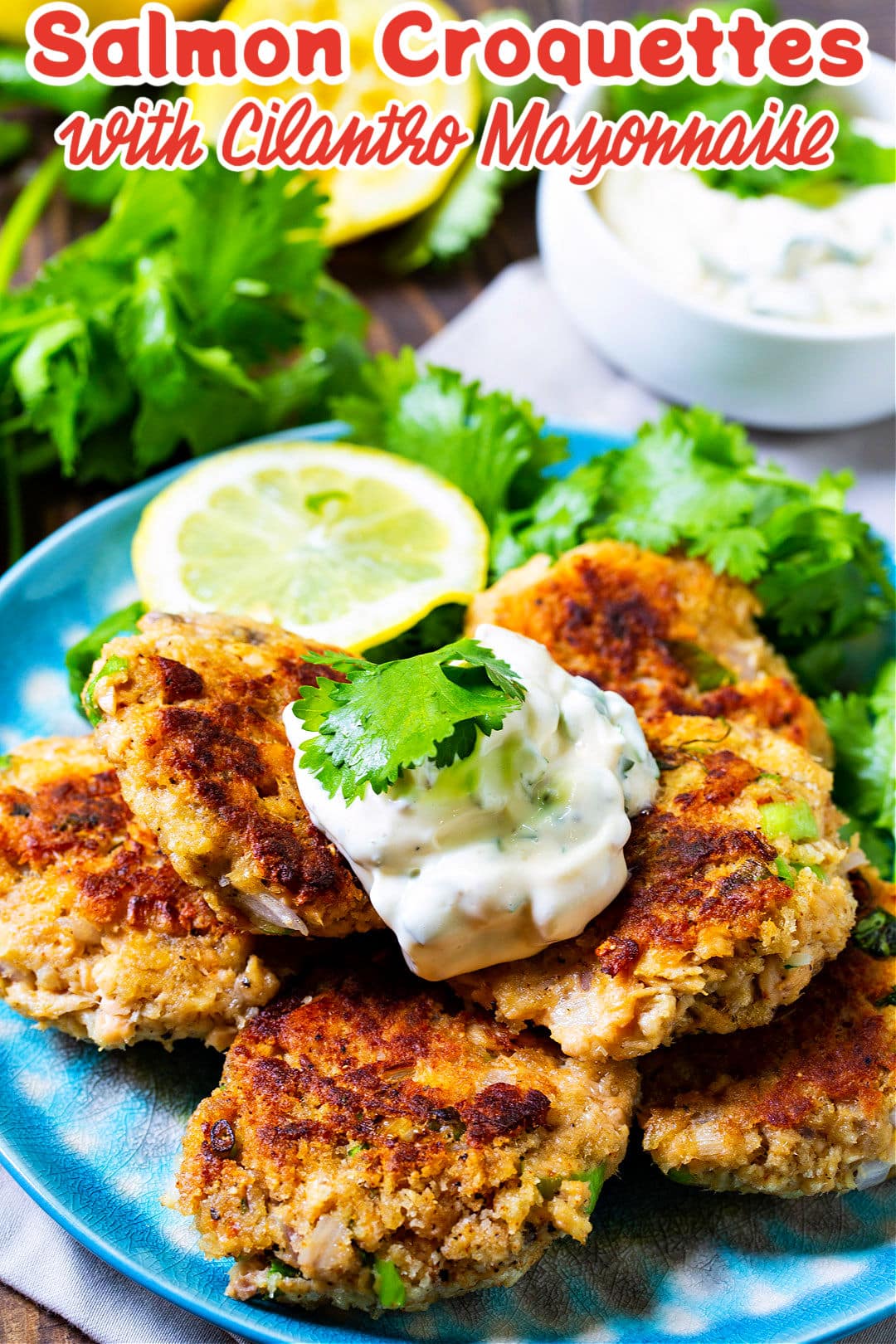 Salmon Croquettes with Cilantro Mayonnaise on a plate.