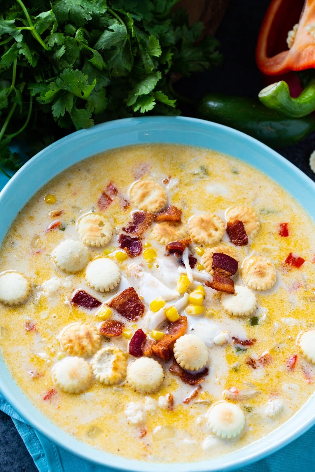 Crab Chowder in blue bowl.