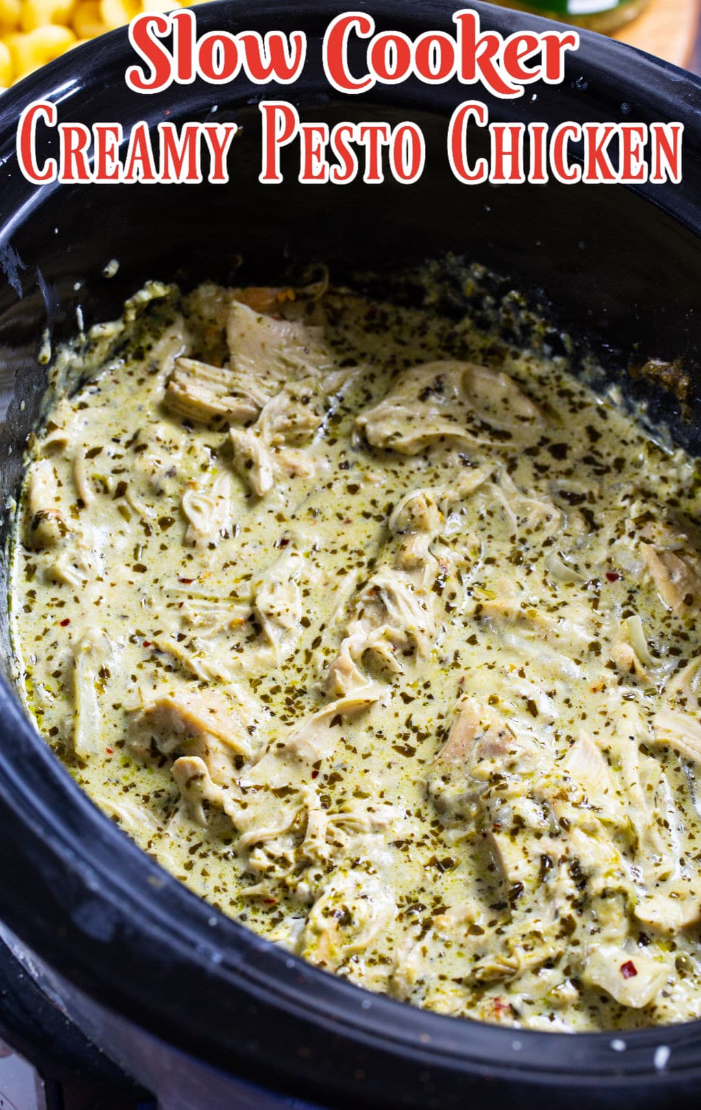 Slow Cooker Creamy Pesto Chicken in slow cooker.