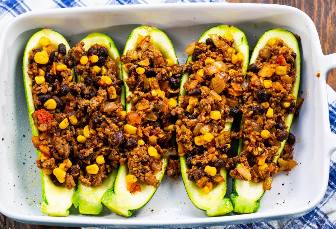 Ground beef filling in zucchini.