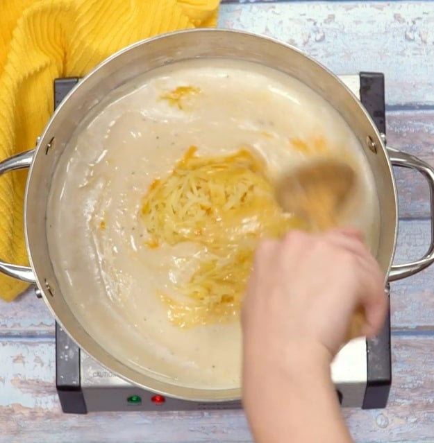 Adding the cheese.