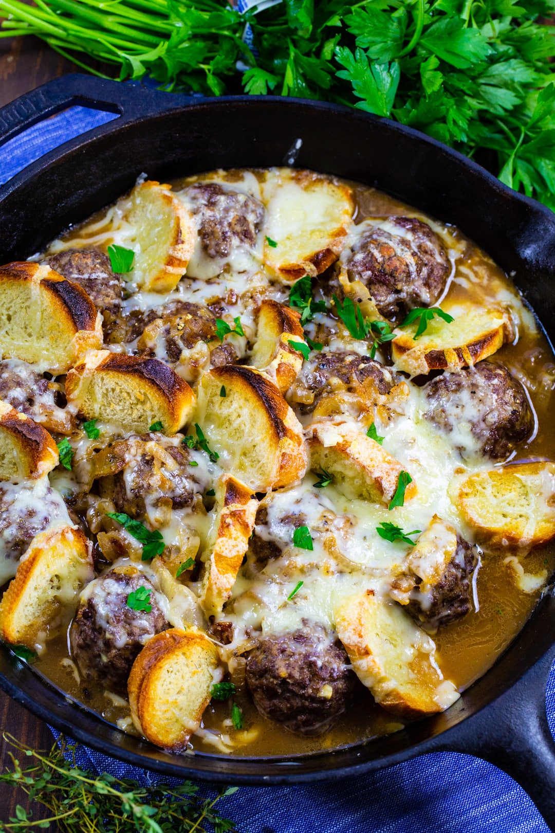 French Onion Meatballs in cast iron skillet.