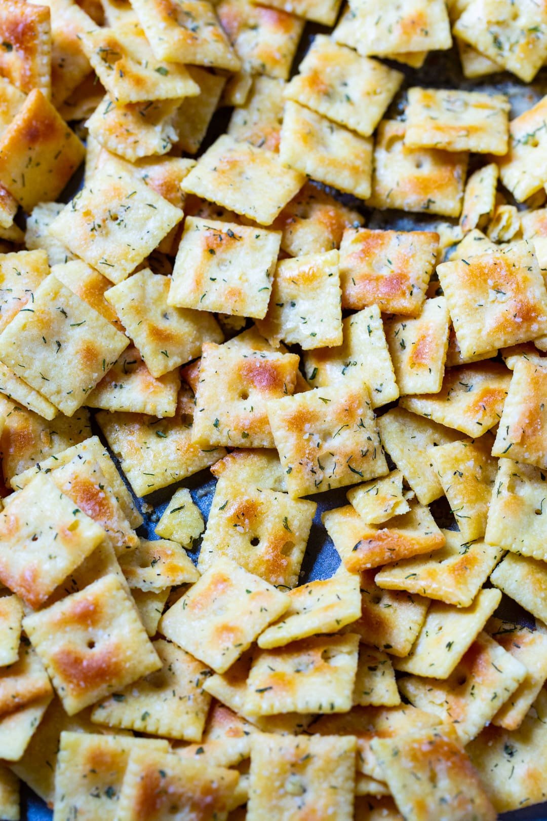 Cheez-Its on a baking sheet.