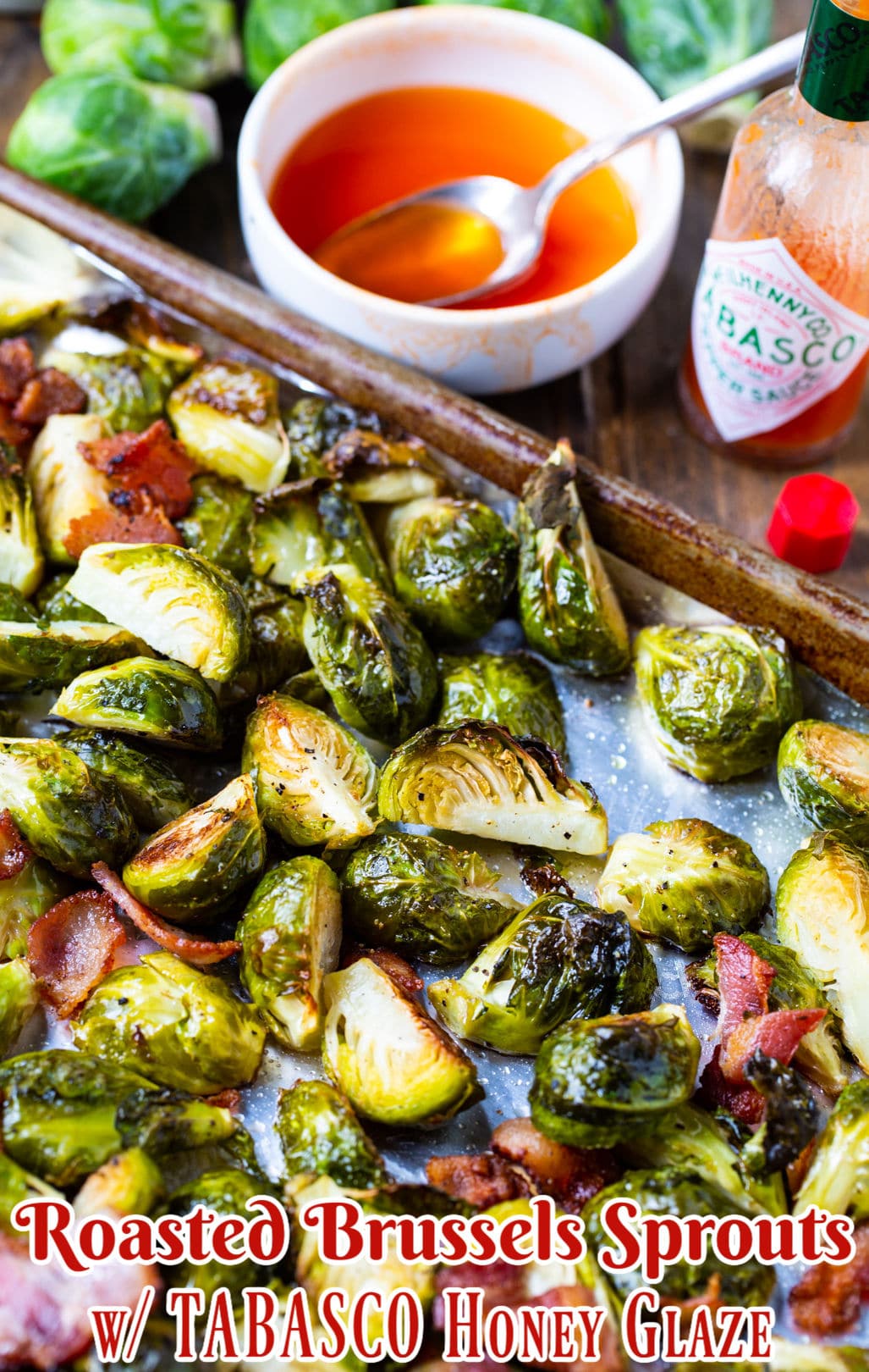 Roasted Brussels Sprouts with Bacon and TABASCO Honey Glaze on baking sheet.