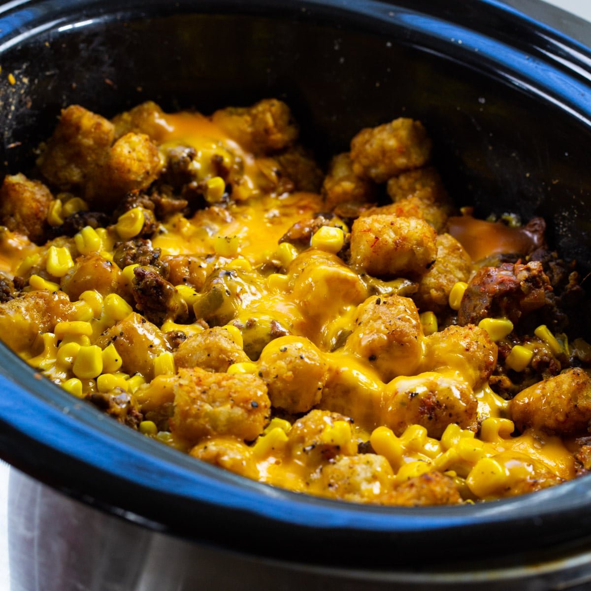 Slow Cooker Taco Tater Tot Casserole in a slow cooker.