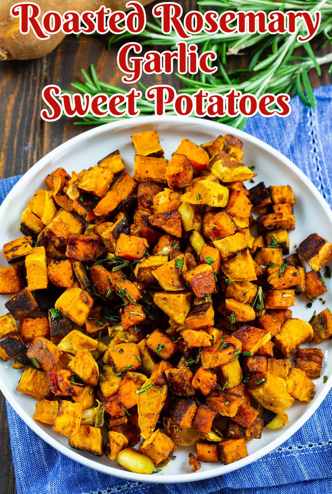 Roasted Rosemary Garlic Sweet Potatoes connected  a serving plate.