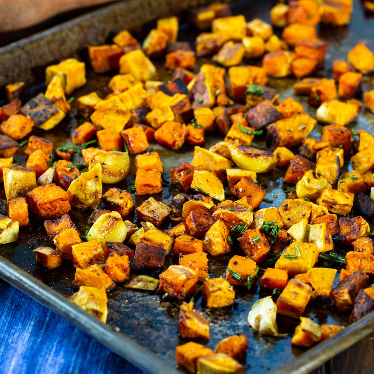 Roasted Rosemary Garlic Sweet Potatoes on a baking sheet.