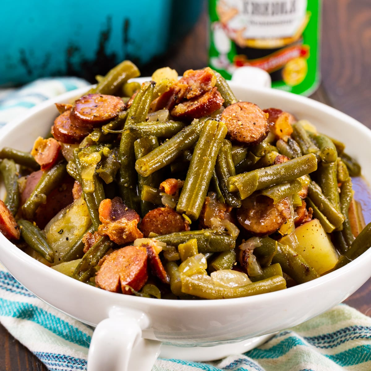 Smothered Cajun Green Beans in a serving dish.