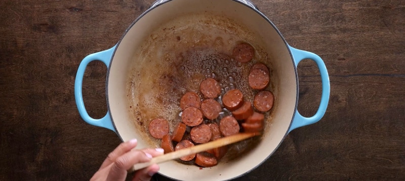 Cooking the sausage.