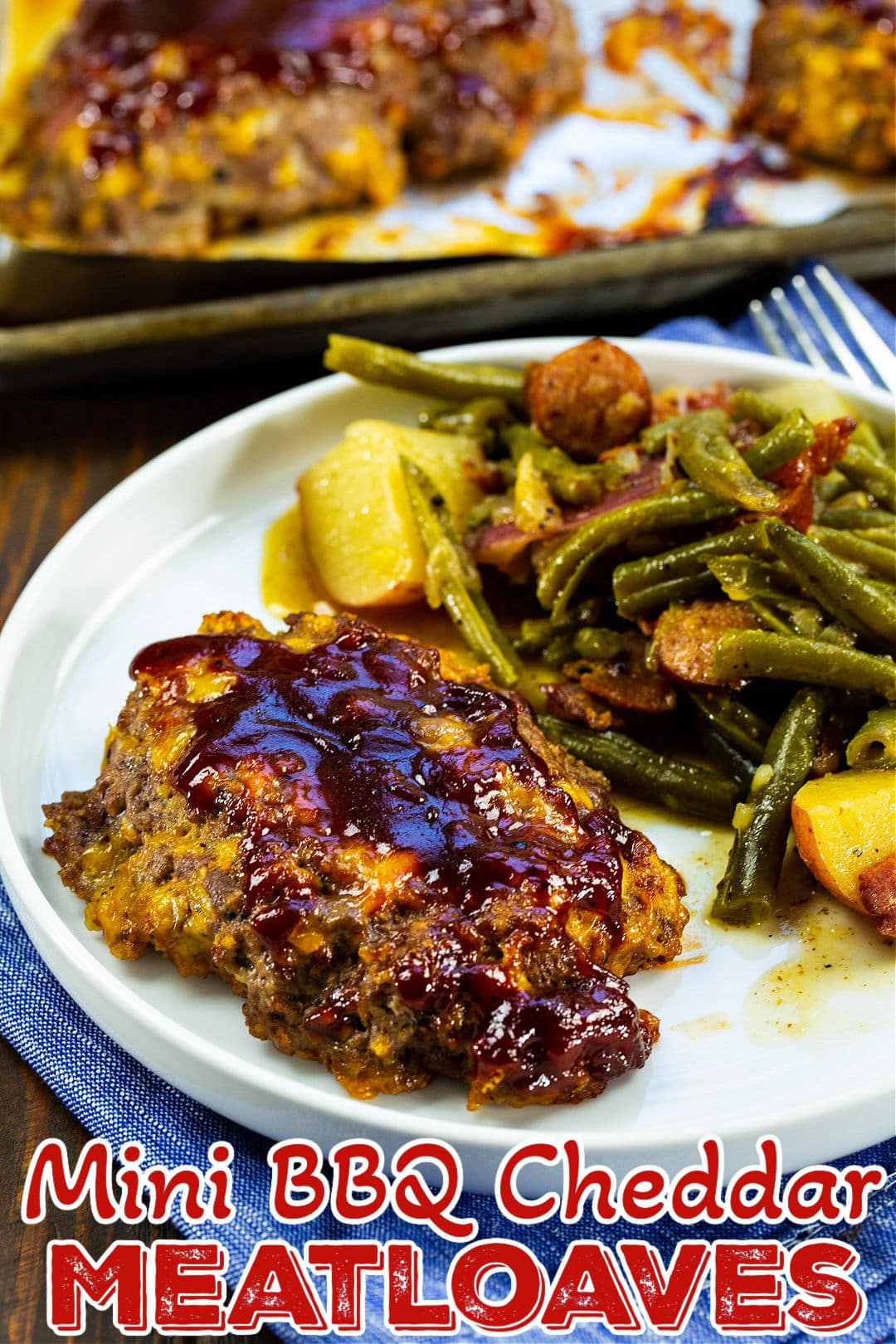 Mini BBQ Cheddar Meatloaf on plate with green beans.
