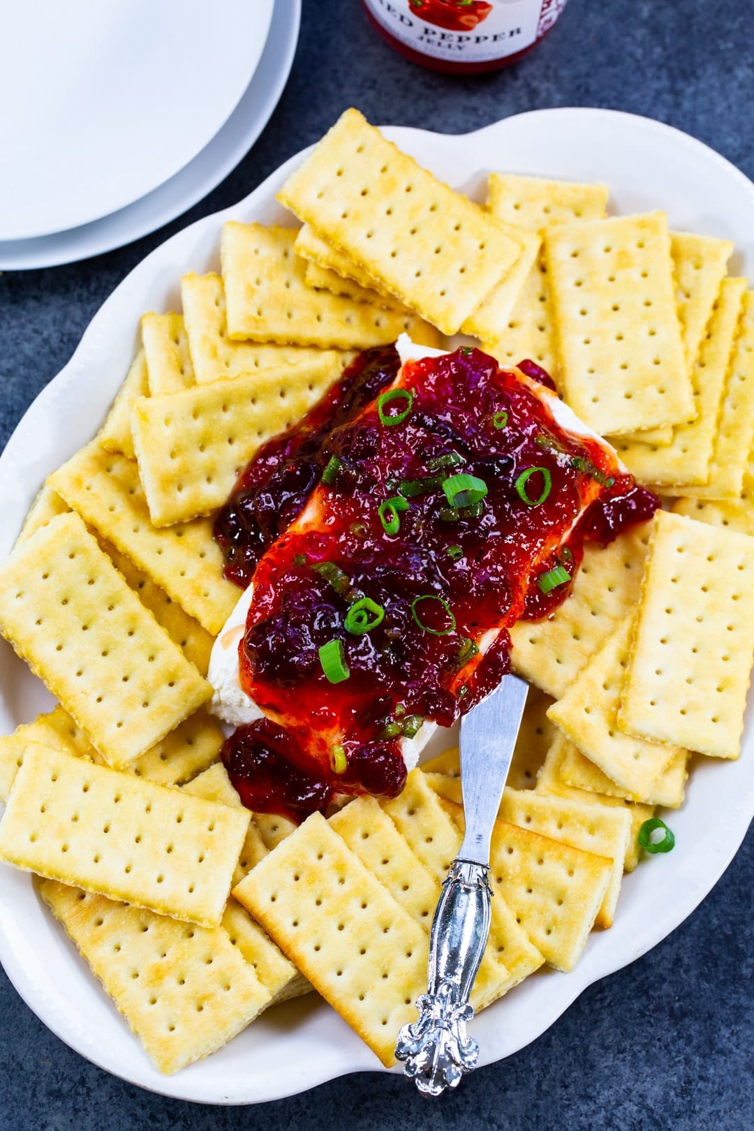 Cranberry Pepper Jelly Spread on top of cream cheese.