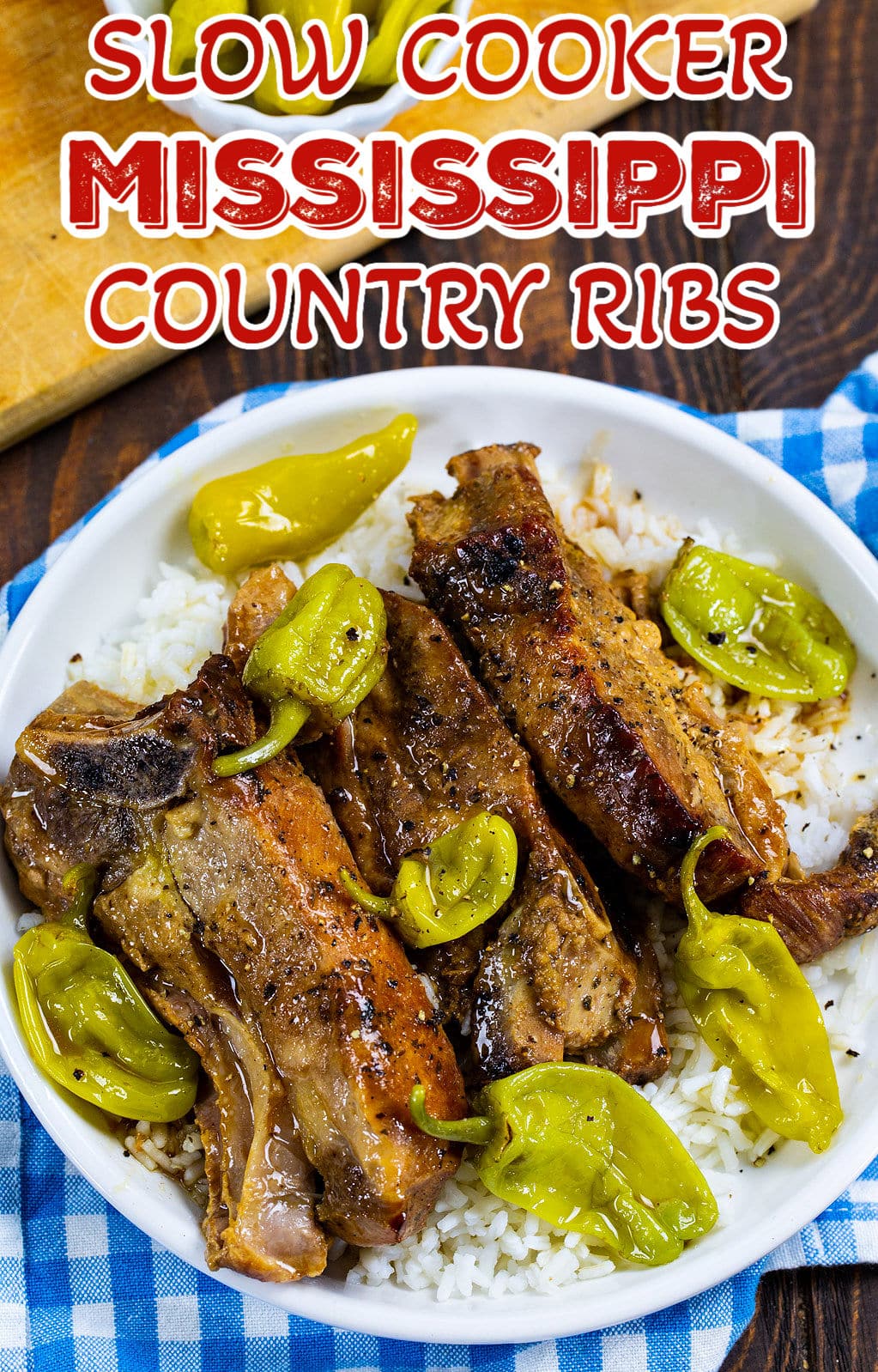 Slow Cooker Mississippi Country Ribs over rice on a plate.