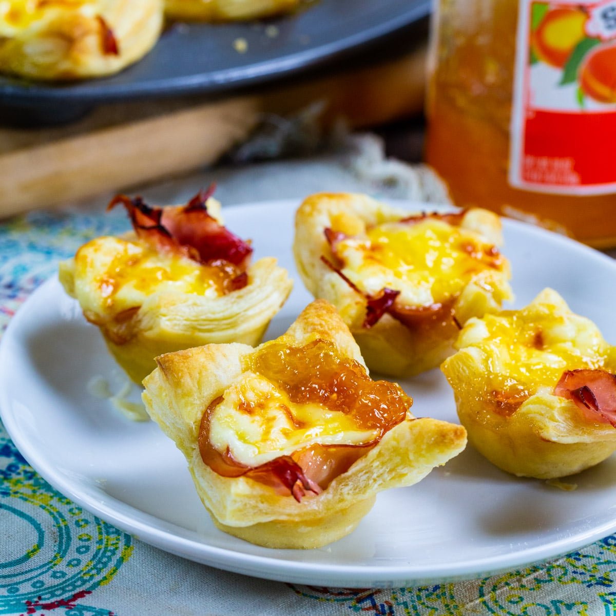 Ham and Brie Puff Pastry Cups on a plate.
