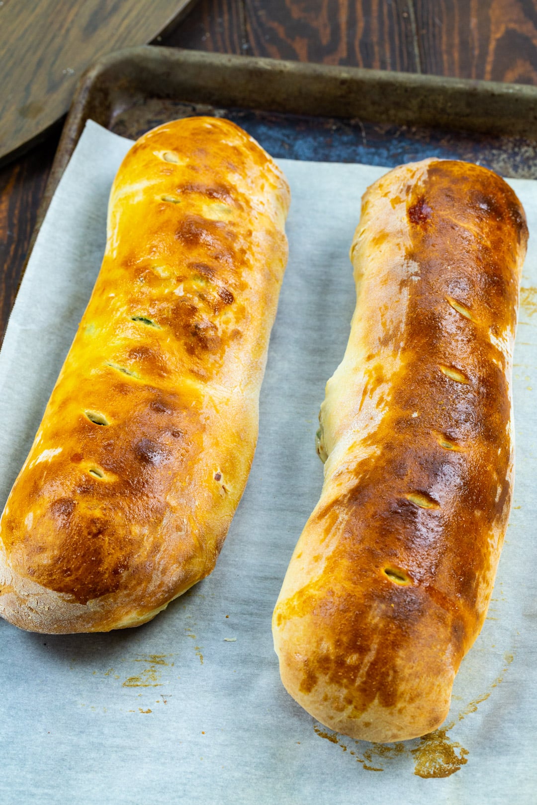 Two loaves of Sausage Spinach Bread.