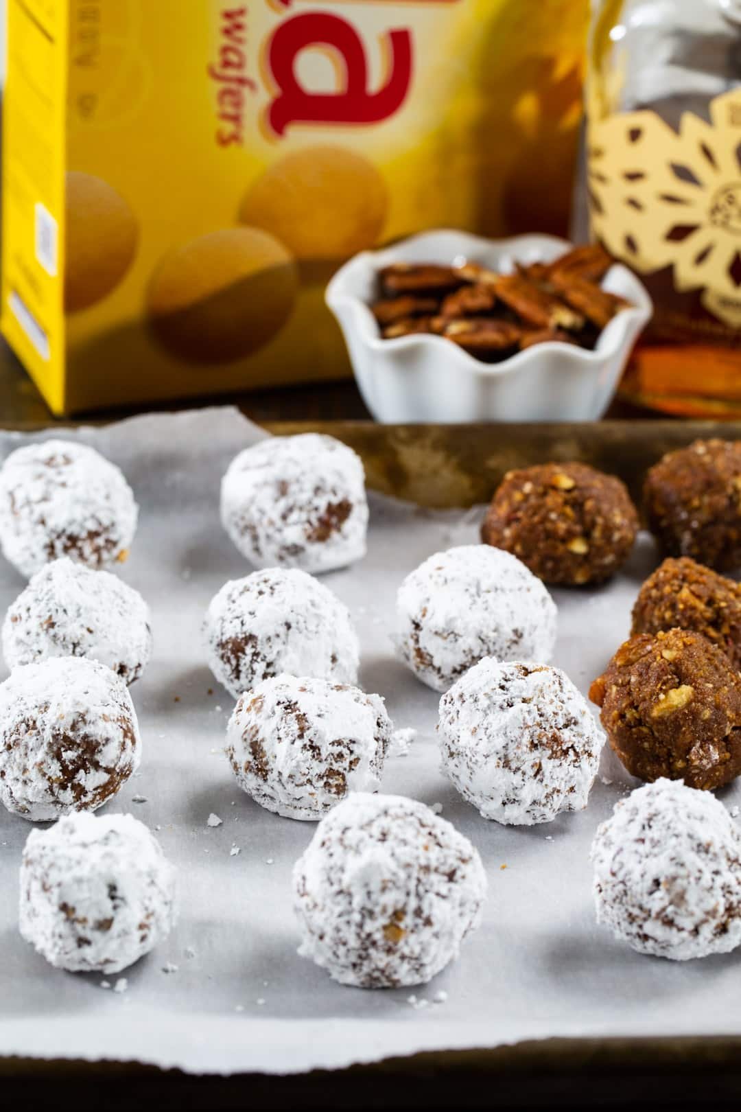 Bourbon Balls coated in powdered sugar.