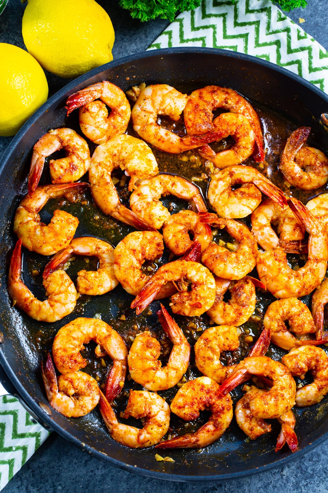 Cooked Cajun Shrimp in a skillet.