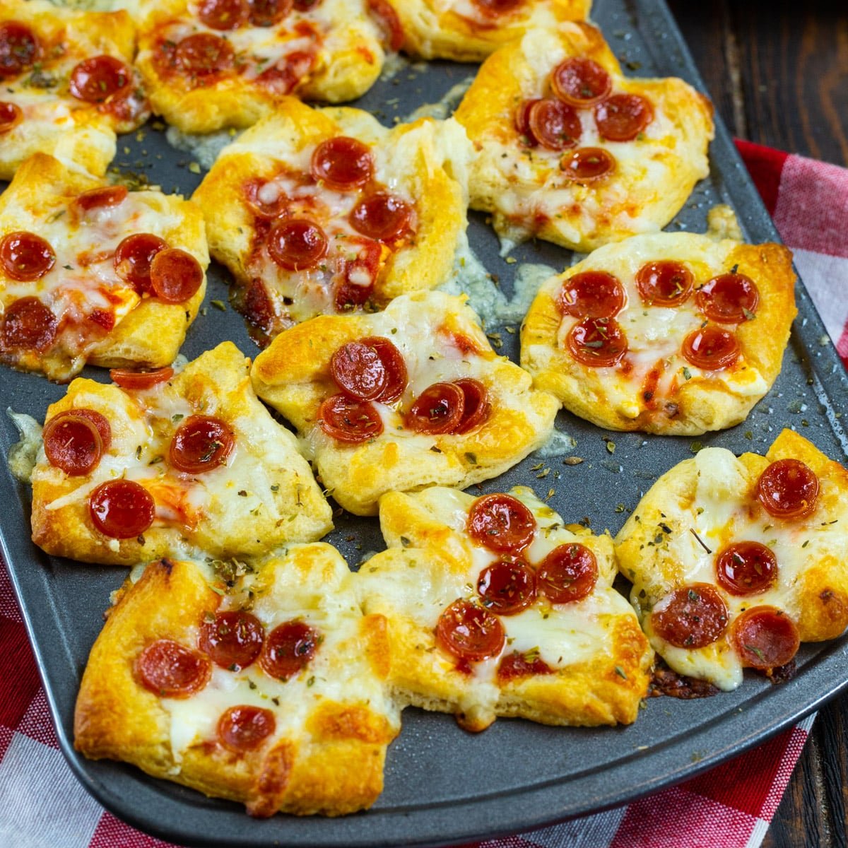 Pepperoni Pizza Poppers in a mini muffin tin.