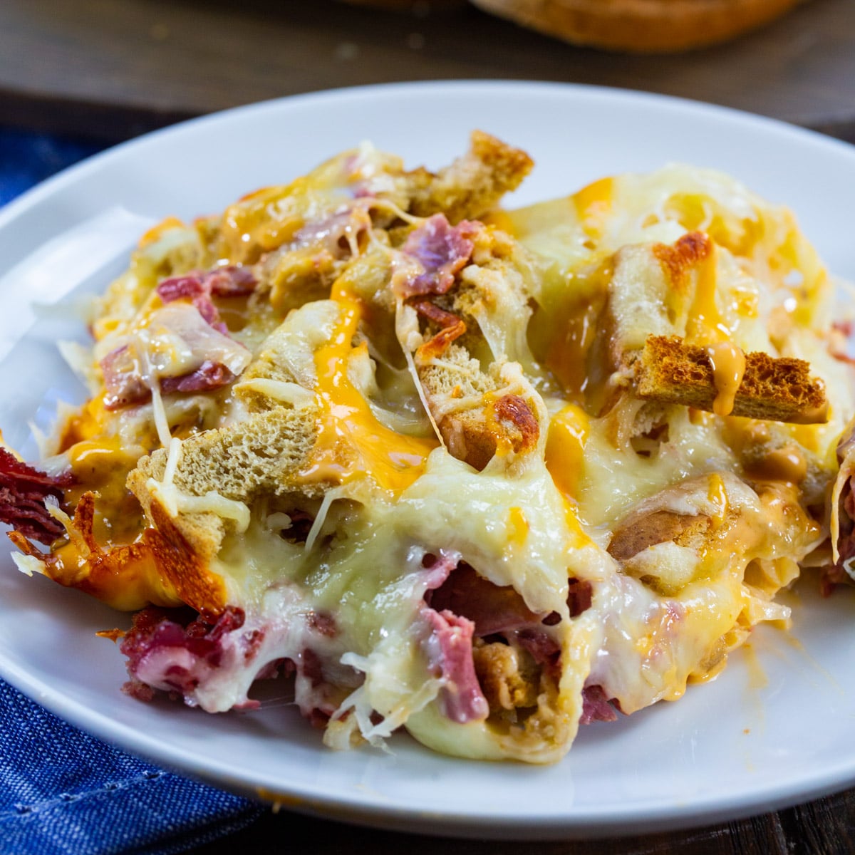 Reuben Casserole dished up on a plate.