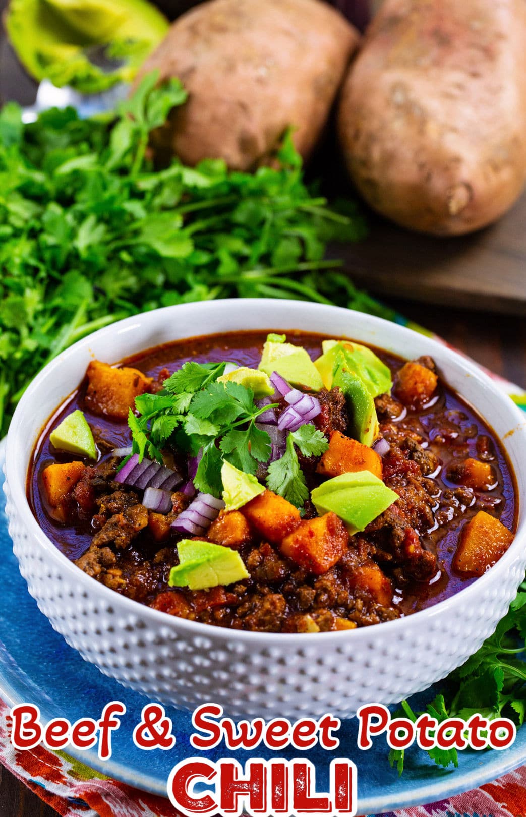 Slow Cooker Beef and Sweet Potato Chili in a white bowl.